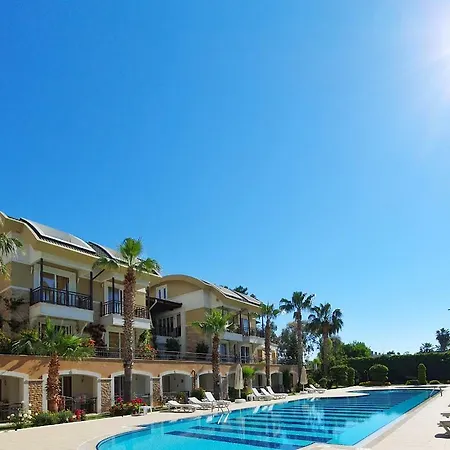 Apartamento дублекс с 2 спальнями в 100м от моря Sultan Homes Kemer